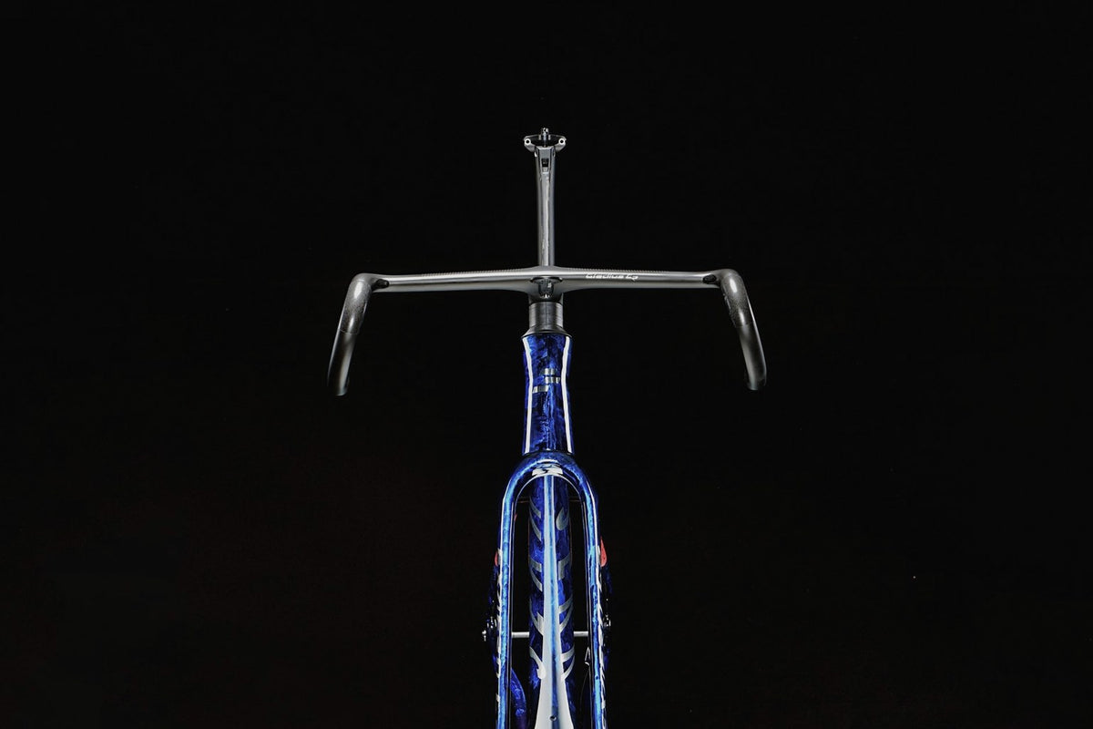 ExAero GR head-on, fork and bars against near darkness