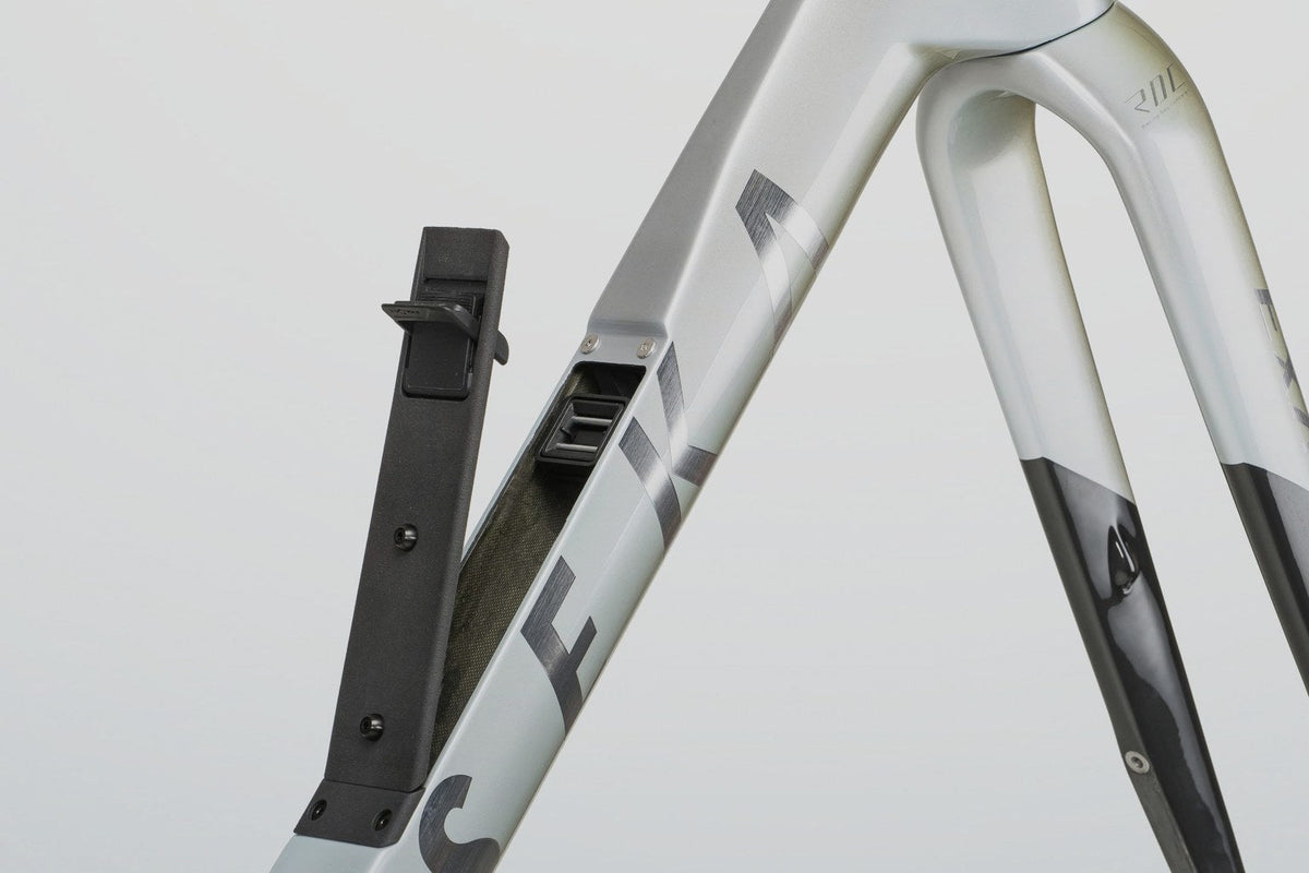 Down tube opening and internal routing at the head tube